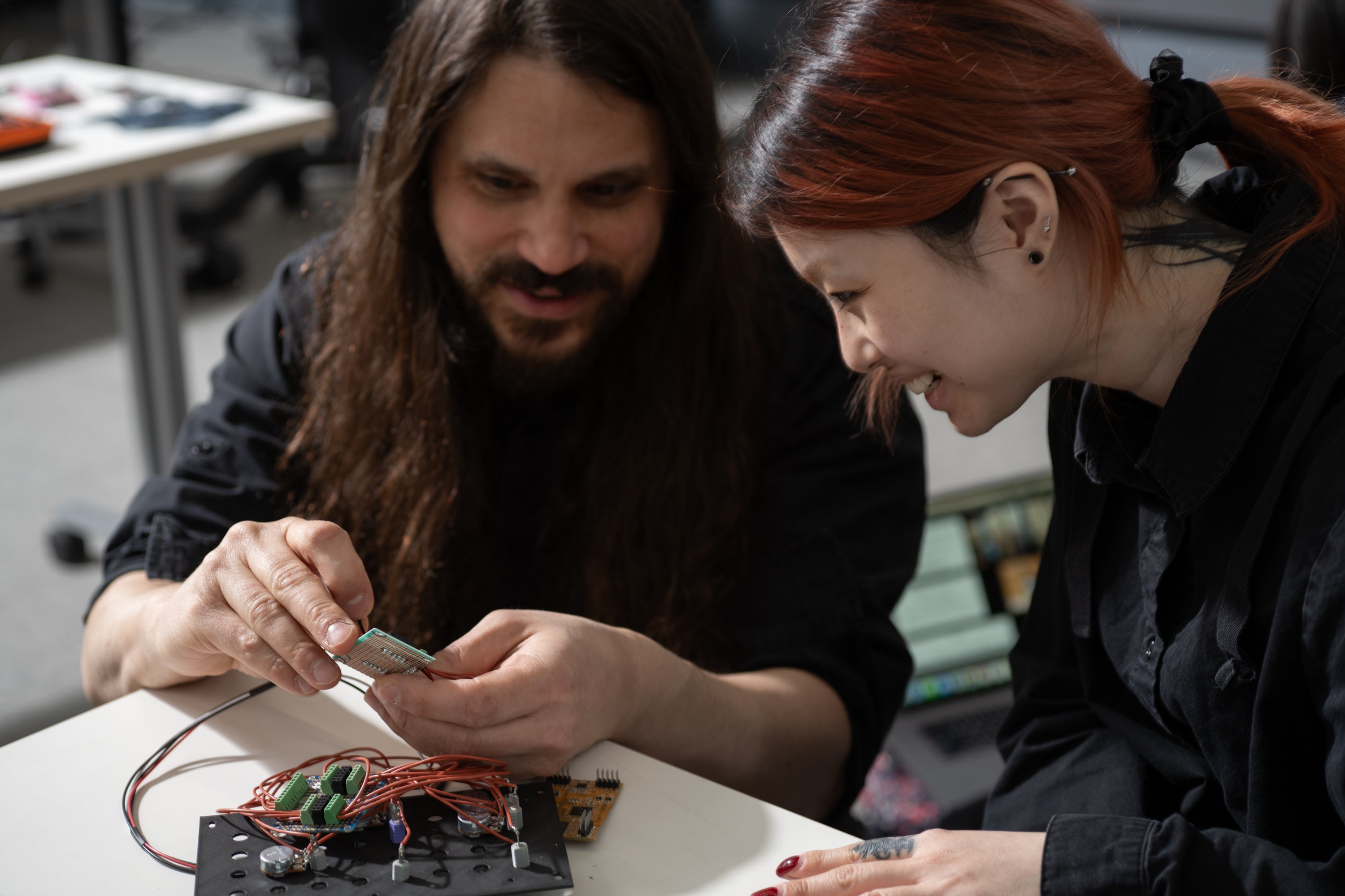 RISD Research Fellow & faculty member Alex Chechile and student Ada Wu with a prototype Daisy module. Photo by Karen Philippi.